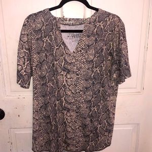 Woman’s top size L with cut out neck